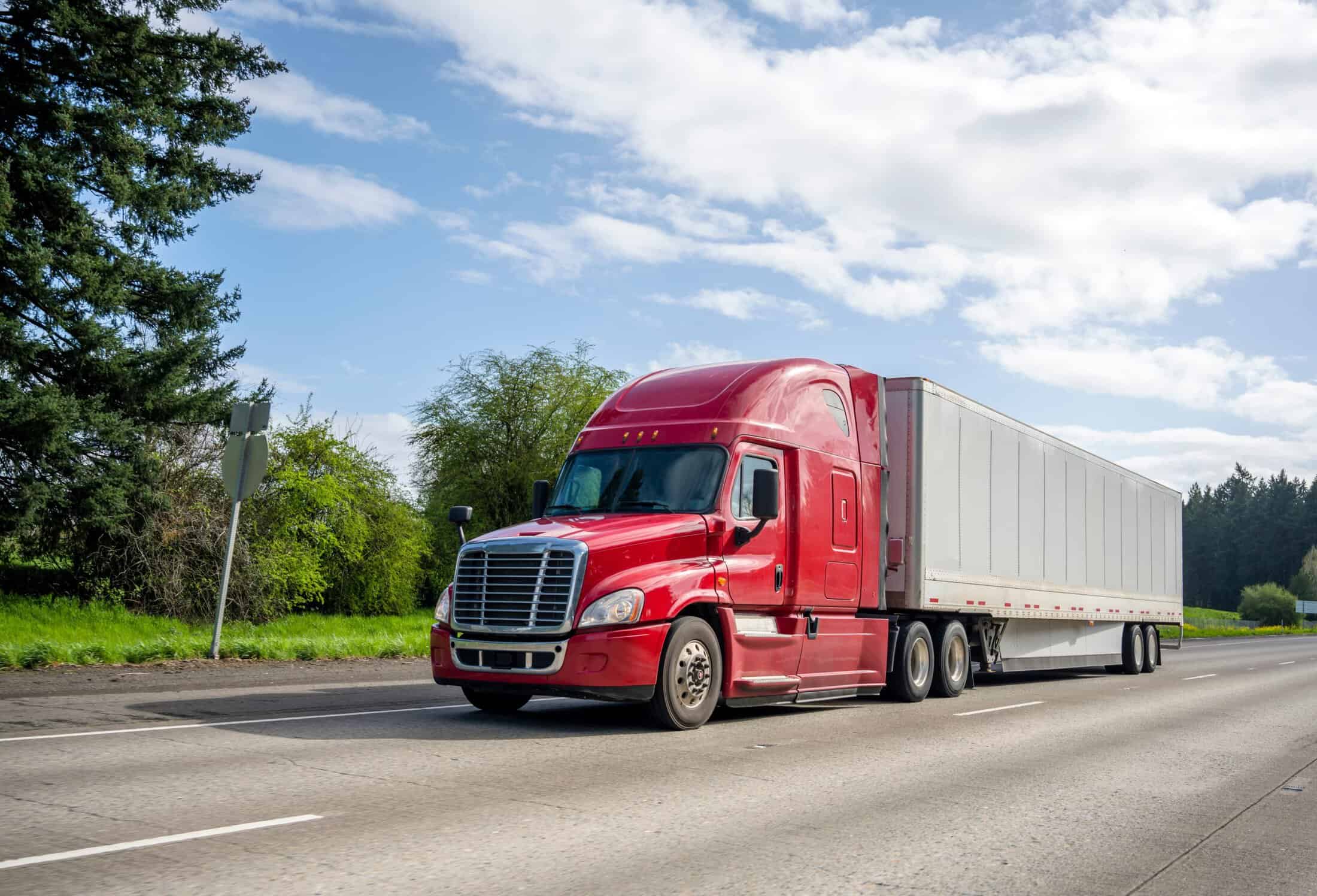 Red semi-truck driving