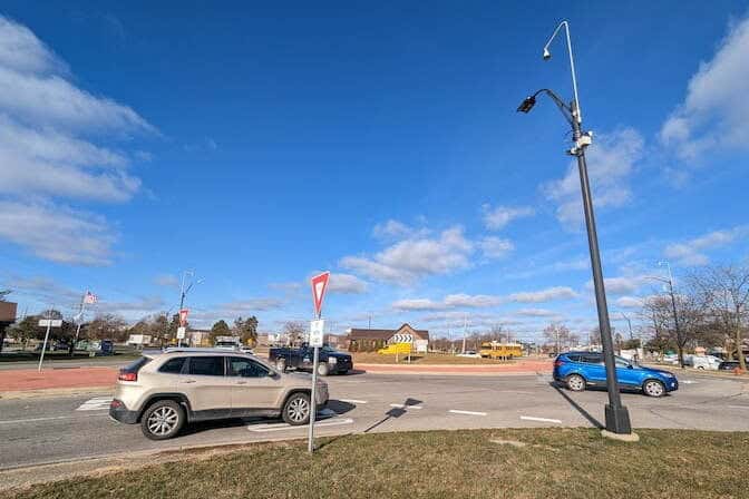 Vehicle enters a two lane roundabout